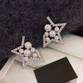 Silver Tone Open Star Stud Earrings with Pearl Look Beads view 6