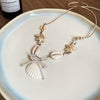 Cowrie Shell Bow