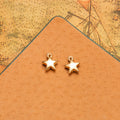Miniature Dimensional Star Charm In Four Metal Finishes view 6