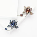 Crystal Tulip Brooch With Faceted Crystals And Polished Metal Details view 1