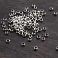 Small Round Metal Spacer Beads in Two Antique Finishes view 3