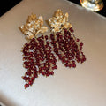 Red Beaded Grape Cluster Leaf Drop Earrings with Polished Metal Accents view 6