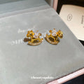 Gold Tone Rocking Horse Stud Earrings With Clear Crystals view 2