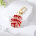 Gold Tone Enamel Monstera Leaf Clip Keychains in Five Colorways view 6