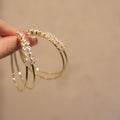 Layered Crystal Hoop Clip On Earrings In Gold And Silver view 7