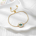 Gold Tone Peacock Feather Evil Eye Slider Bracelets in Nine Shapes view 3