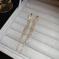 Crystal Bow Stud Earrings with Fine Chain Tassel Drops view 6