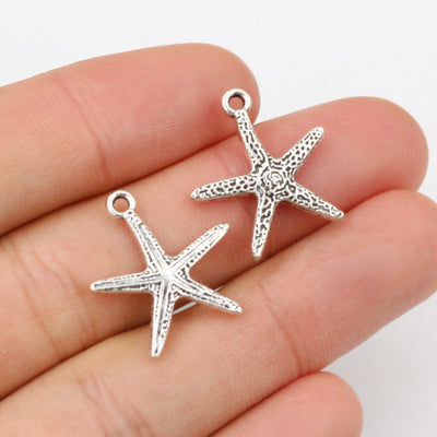 Textured starfish charms showing assorted shapes and finishes