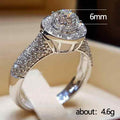 Silver Tone Round Center Stone Pavé Ring With Polished Clear Stone Detail view 4