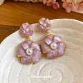 Lavender Flower Drop Earrings with Pearly Petals and Round Centers view 4