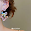Pink Heart Crystal Floral Cluster Stud Earrings with Polished Metal Details view 4