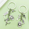 Western Cowboy Charm Keychains Featuring Silver Boot Across 30 Pictured Variations view 1