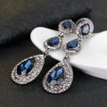 Silver Tone Triple Teardrop Crystal Crystal Four Designs Metal Dangle Earrings view 4
