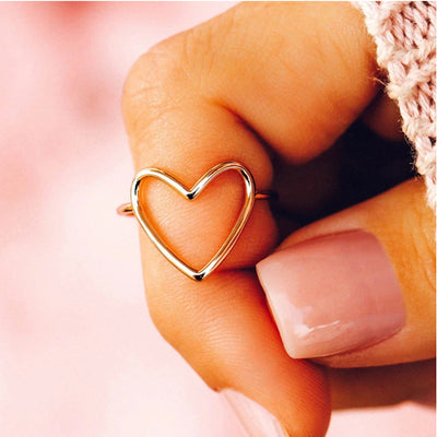 Product view showing open heart outline ring