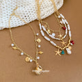 Coastal Shell and Starfish Charm Necklace with Pearl Accents view 2
