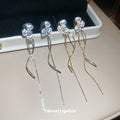 Three Petal Flower Linear Tassel Clip On Earrings With Polished Metal Details view 2