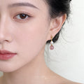 Gold Tone White Pearl And Pink Round Stone Stud Earrings view 2