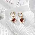 Gold Tone Faceted Crystal Heart Huggie Earrings in Eleven Color Options view 5