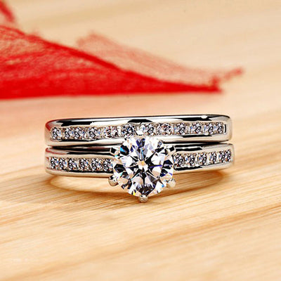 Silver-tone round solitaire three-band ring set