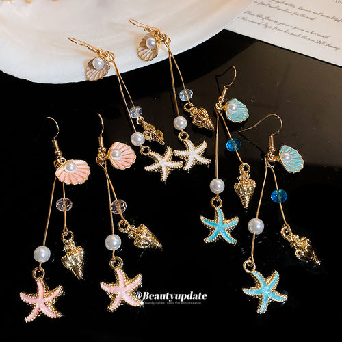 Modeled view of coastal charm hook earrings