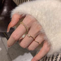 Gold Tone Three Piece Crystal Heart Wave And Textured Ring Set view 3