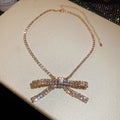 Crystal Bow Pendant Necklaces in Gold and Silver Tones view 6