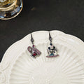 Gunmetal Asymmetric Teacup Cake Crystal Drop Earrings view 1