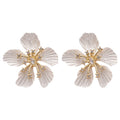 White Textured Flower Stud Earrings with Gold Tone Centers view 5