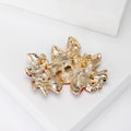 Red Crystal Flower and Green Leaf Cluster Brooch in Gold Tone view 3