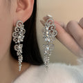 Silver Tone Clear Stone Scroll Chandelier Long Earrings view 1