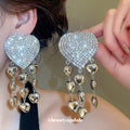 Crystal Heart Tassel Earrings in Polished Statement Design view 1