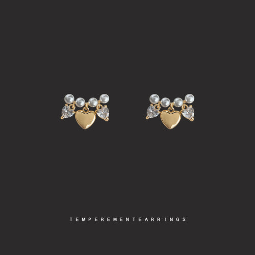 Gold pearl bar heart charm crystal studs on dark grey