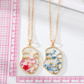Silver Tone Resin Pressed Flower Face Pendant Necklaces in Three Colors view 4