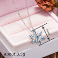 Silver-Tone Snowflake Pendant Necklace with Blue Marquise Stones view 4