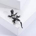 Branch Lizard Brooch in Metal with Textured Lizard Resting on a Slender Branch view 4