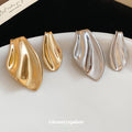 Gold Tone Asymmetric Fishtail Stud Earrings Statement Jewelry view 1