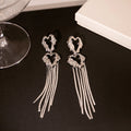 Silver Double Heart and Long Chain Tassel Earrings view 3