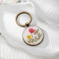 Antique Bronze Round Pressed Flower Split-Ring Keychains in Three Designs view 2