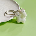 Pair of White Flocked Sheep Figures on Silver Tone Keychain view 1