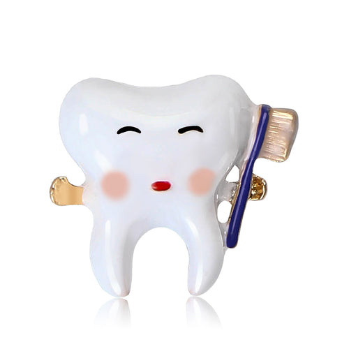White enamel tooth brooch with blue toothbrush handle front view