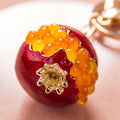 Jewel Filled Pomegranate Keychains in Red and Green view 1