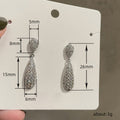 Silver Tone Pavé Teardrop Drop Earrings With Round Stud Tops view 5