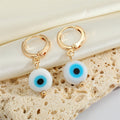 Gold Tone Round Glass Evil Eye Huggie Drop Earrings in Four Colors view 5