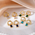 Gold Tone Open Loop Earrings With Deep Blue Rectangle Drops view 1