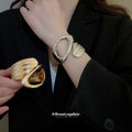 Two Open Geometric Cuff Designs In Gold Or Silver Tone view 2