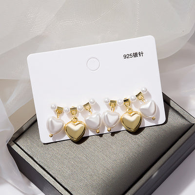 Primary supplied view of heart charm cluster studs