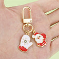 Christmas Charm Keychains Featuring Santa Across 45 Pictured Variations view 2