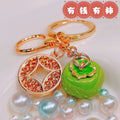 Braided Coin and Persimmon Wrist Strap Keychains in Three Colors view 5
