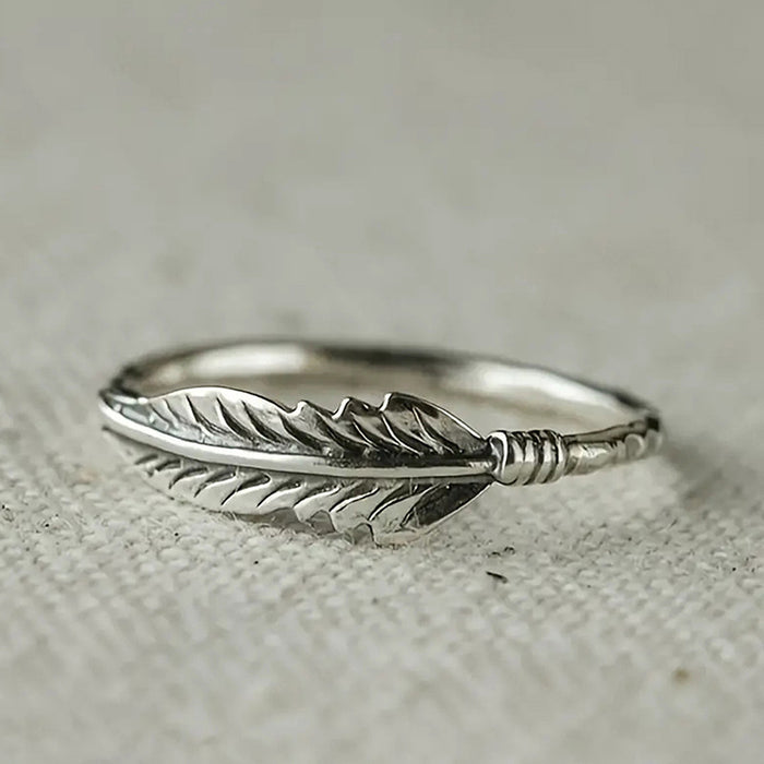 Textured Feather Band Ring In Three Polished Metal Tones