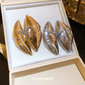 Sculptural Metal Lip Stud Earrings In Gold And Silver view 2
